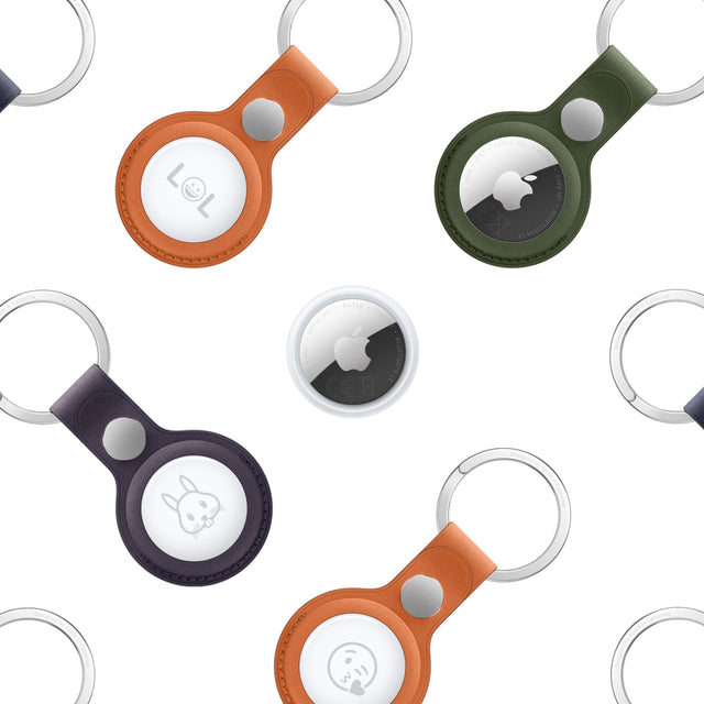 FineWoven Key Rings for AirTag in orange, green, and purple